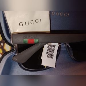 Gucci sunglasses Unisex black frame